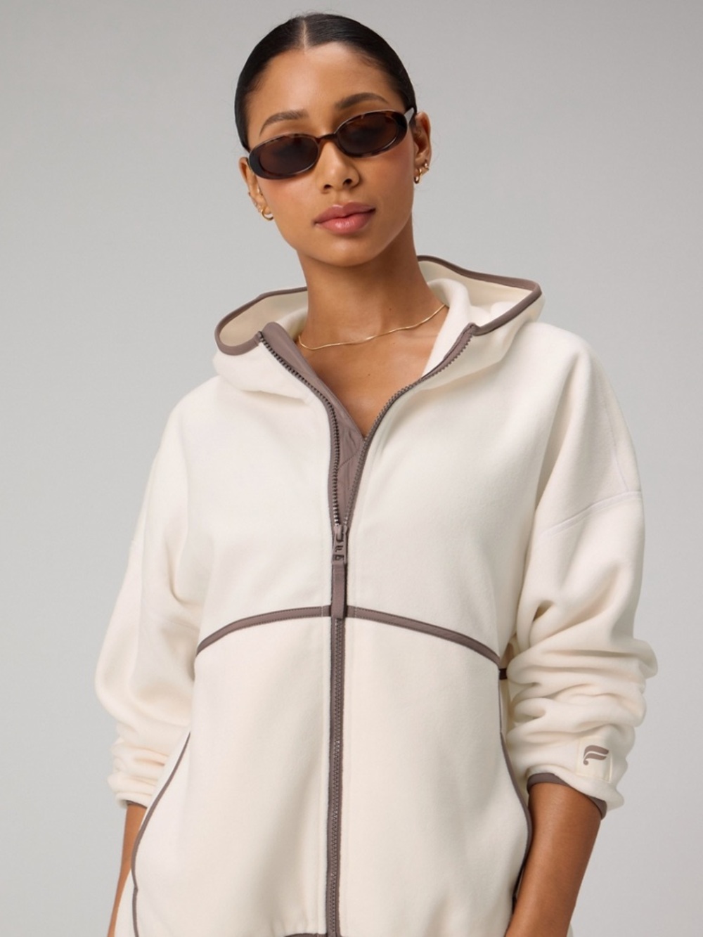 Fabletics No Chill Full-Zip Jacket in Cream with Taupe Trim